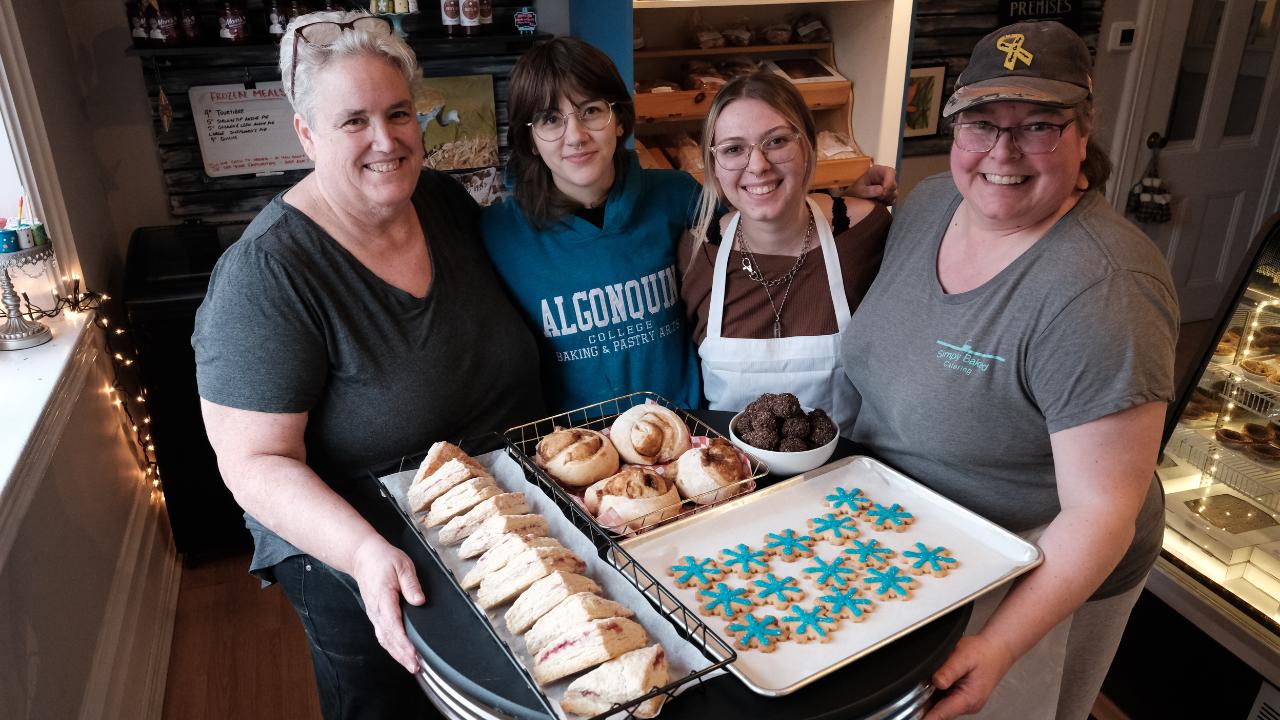 owner and employees and baked goods